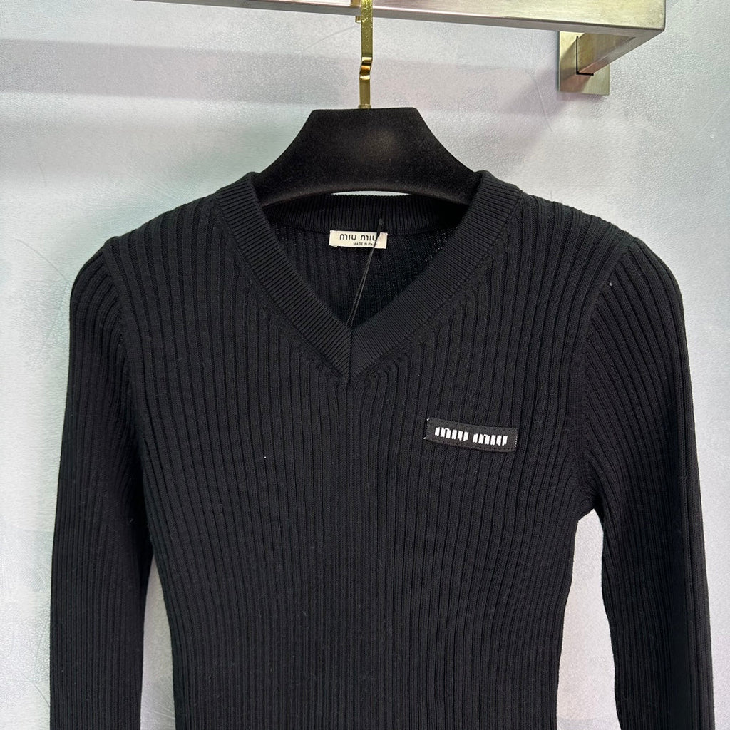 Ribbed High-Neck Wool Sweater